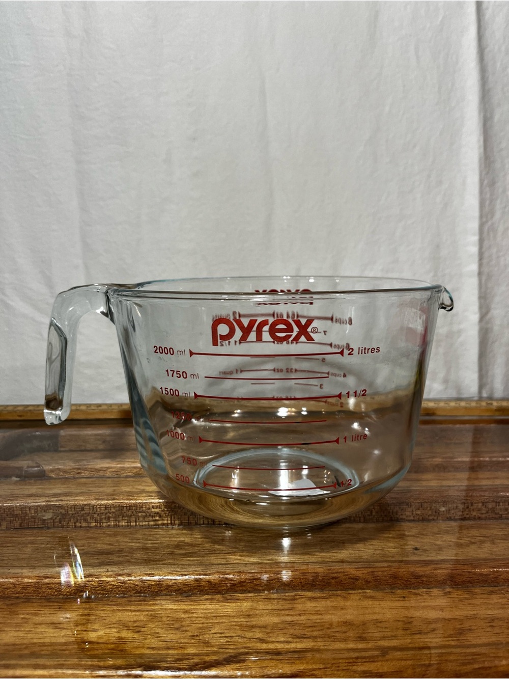 Pyrex Clear Glass Measuring Bowl with Red Logo and Markings 2 Quart/ 2 Liters